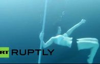 Underwater Pole Dancers Shimmy Beneath The Waves